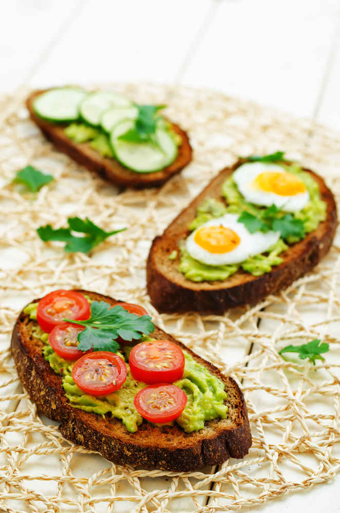 rye toast, mashed avocado, eggs, tomatoes, cucumbers