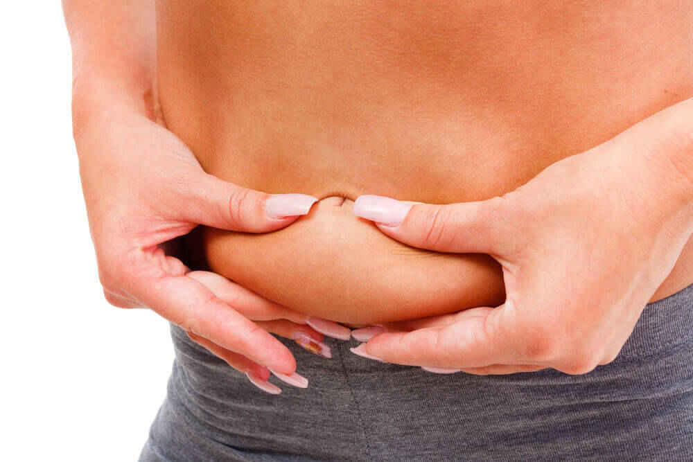 woman measuring weight gain