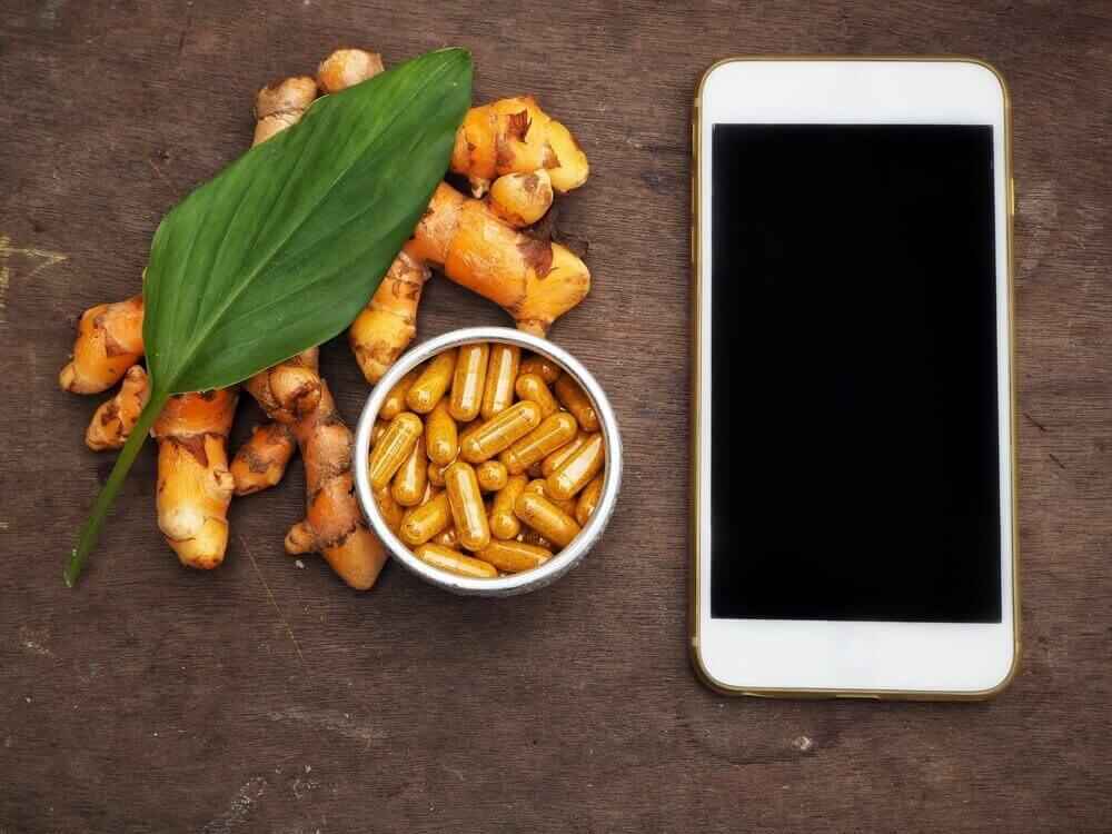 how much turmeric per day