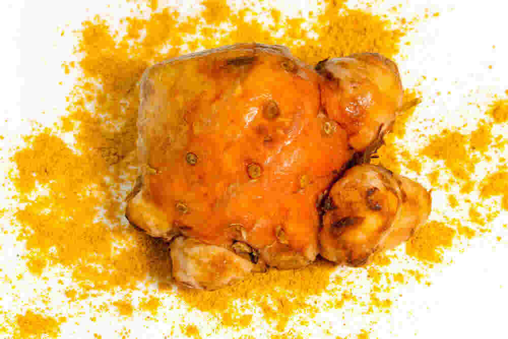 how much turmeric per day